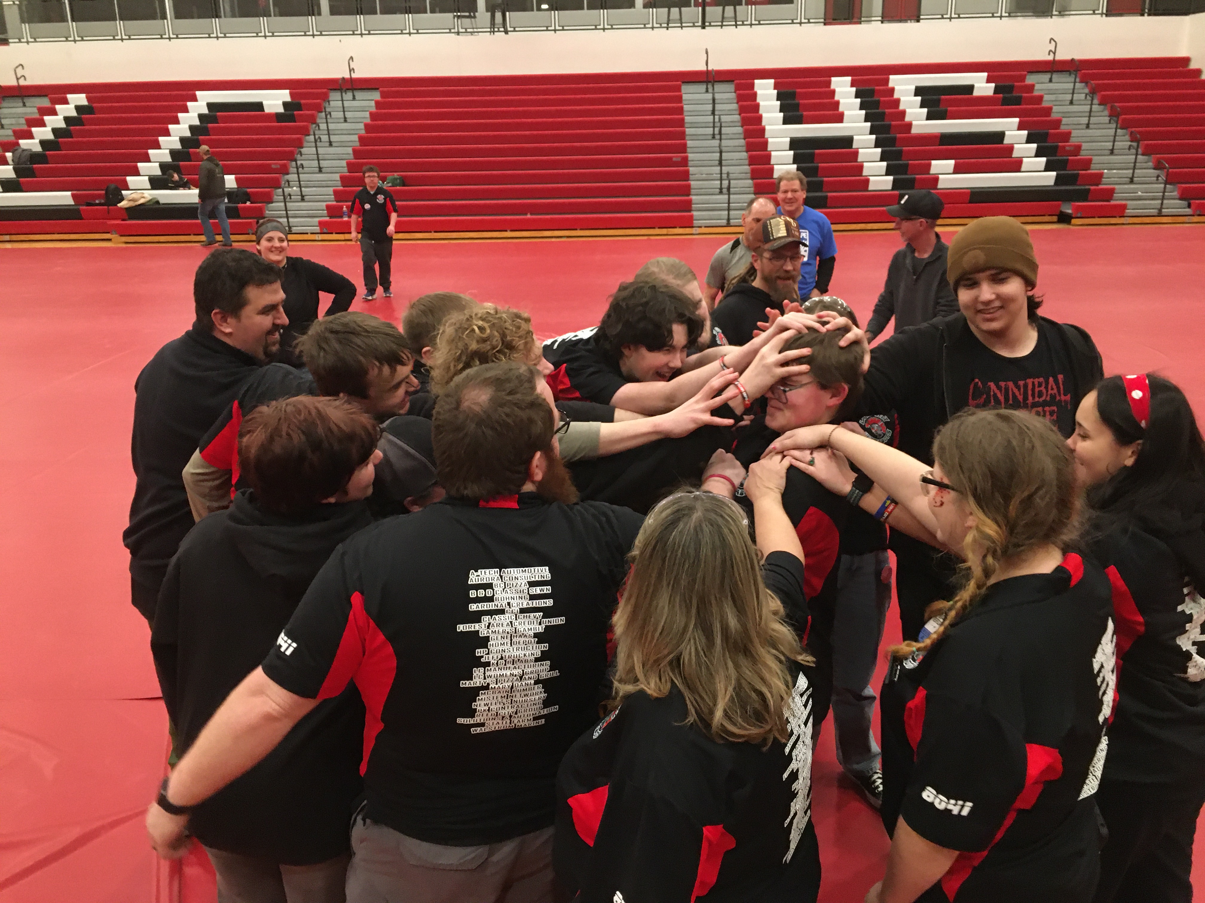 Team 8041 huddle showing gracious professionalism