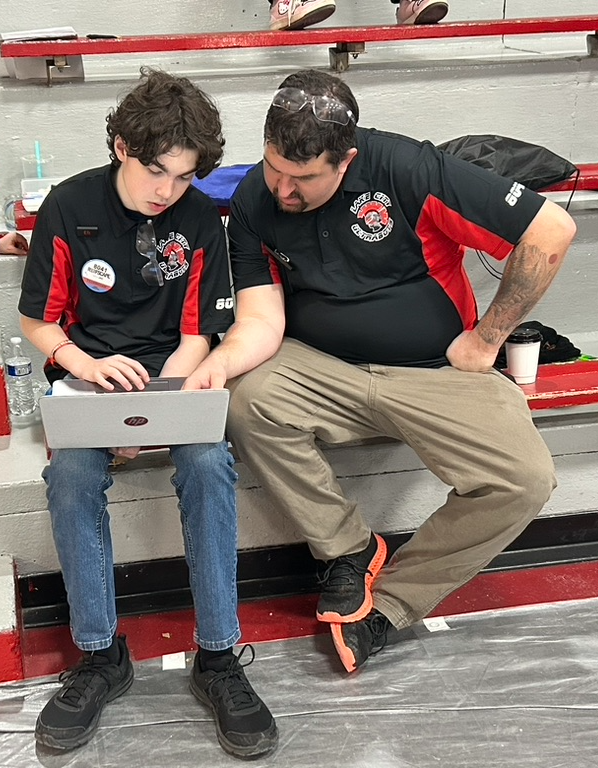 Student programming the robot